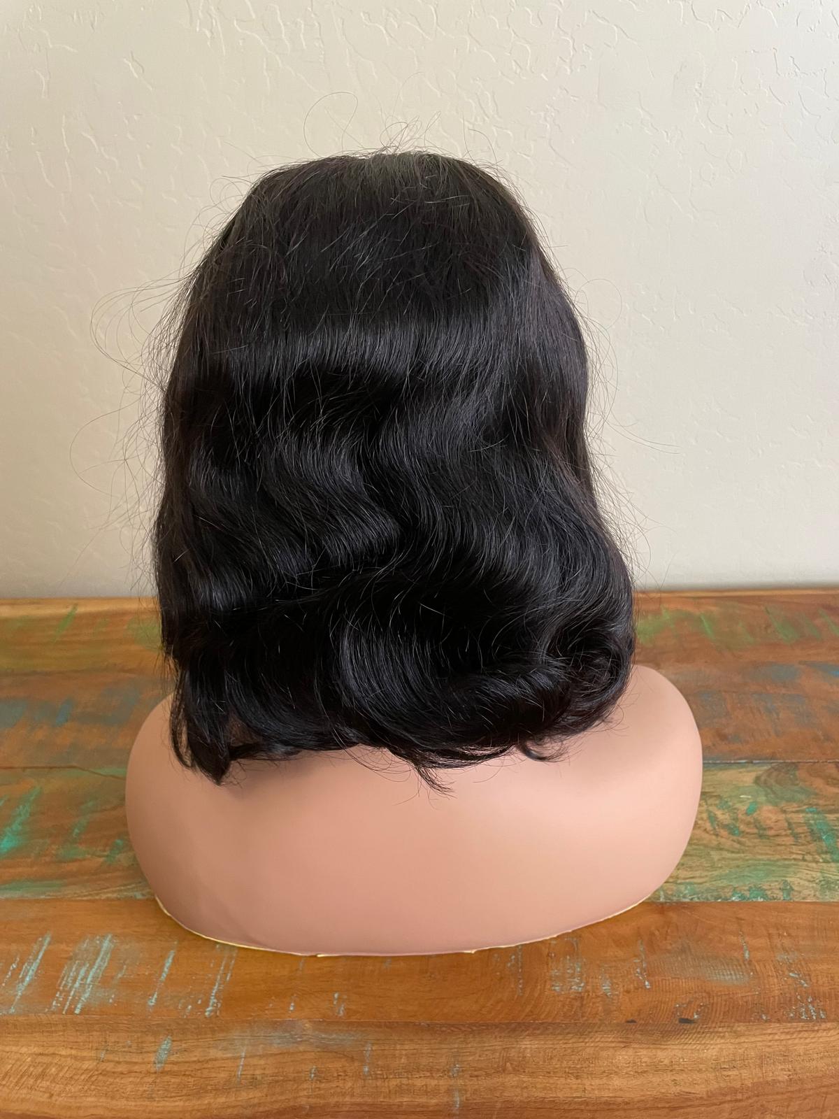 human hair  body wave 16  inches long. 